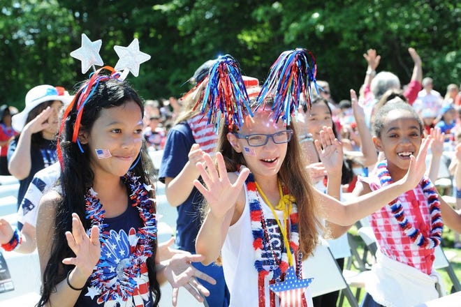 From left, Addison Chu, 9, Skyla Burgo, 10, and Zahra Djidda, 9, during the annual Kennedy Day celebration at the Kennedy School on Friday, June 2, 2017.