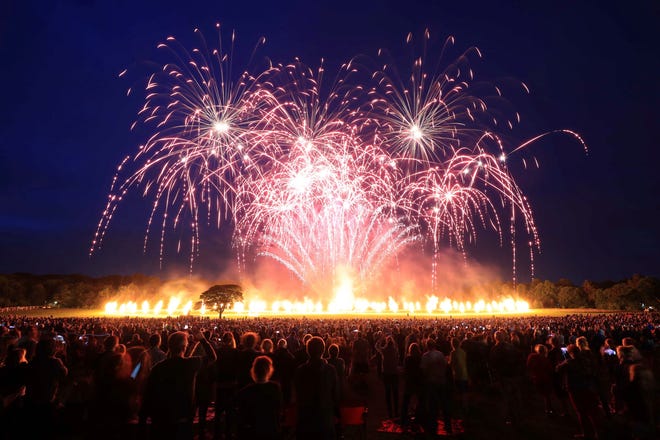 Fireworks during the Lucy in the Sky event 'Suspended Time' in Camp Hill, Liverpool , England, to mark the 50th anniversary of the release of Sgt. Pepper's Lonely Hearts Club Band by The Beatles, Thursday June 1, 2017. (Peter Byrne/PA via AP)