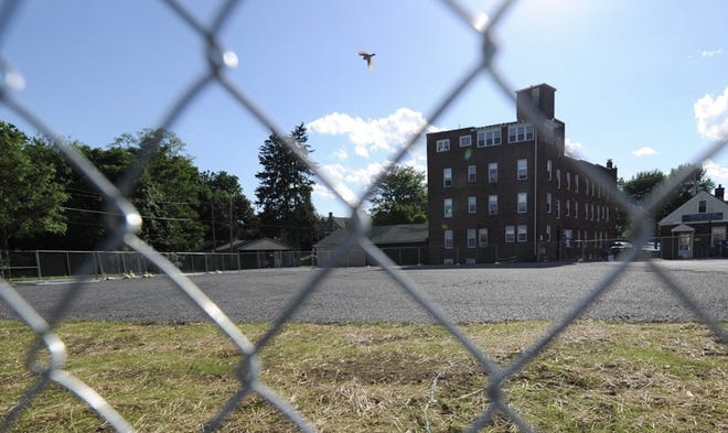 The former CLU Club building at 239 South Courtland Street, East Stroudsburg has been demolished and the lot backfilled. Club members have yet to determine what will happen to the site, seen here on June 1, 2017. [Keith R. Stevenson / Pocono Record]