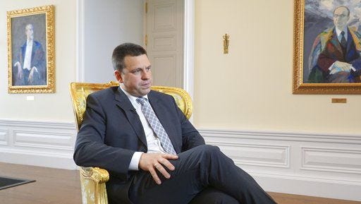 Estonian Prime Minister Juri Ratas answers questions by The Associated Press during an interview in, Tallinn, Friday, June 2, 2017. The nation which will hold the European Union presidency as of next month says that the "very bad, very negative" decision of President Trump to pull the United States out of the global climate agreement will force the 28-nation bloc to take a stronger lead on the issue. (AP Photo/David Keyton)