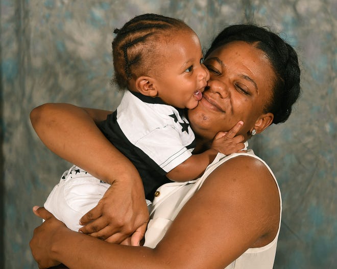 Rahneya Roberson, 18, a student at Pemberton Township High School,holds her son, Trevon Blackmon, 8 months, Monday, May 1, 2017, and is a 2017 Teen Excellence winner.