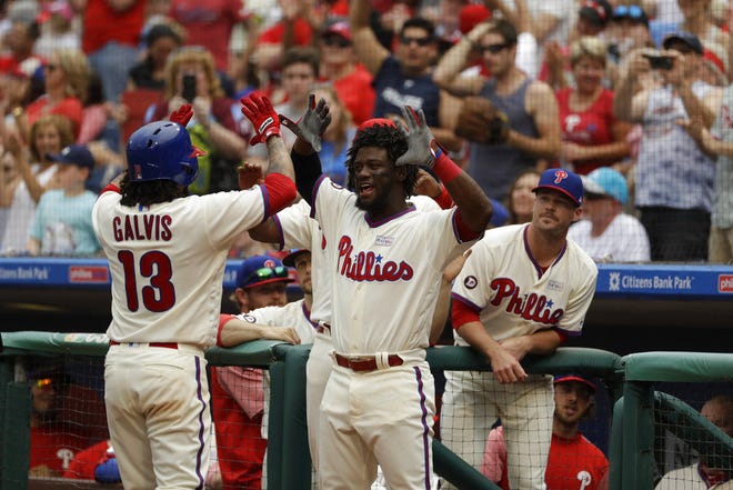 Freddy Galvis (left) and Odubel Herrera celebrate during the game against the San Francisco Giants at Citizen Bank Park in Philadelphia on Sunday, June 4, 2017.