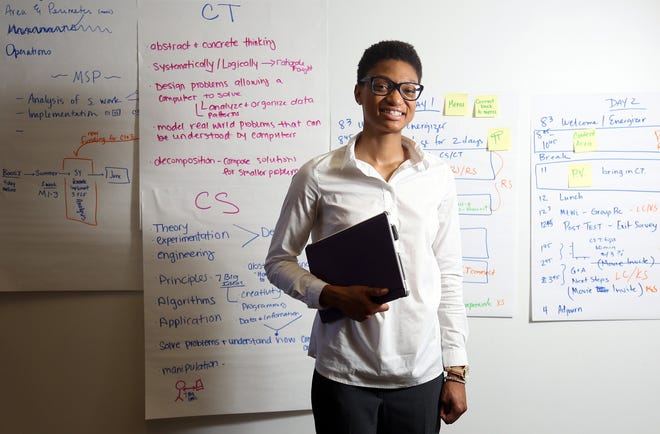 Kasey Wilson, a junior at Ohio Dominican University, is using the programming skills she learned at summer work camps funded by Franklin County at her internship with JPMorgan Chase. [Brooke LaValley/Dispatch]