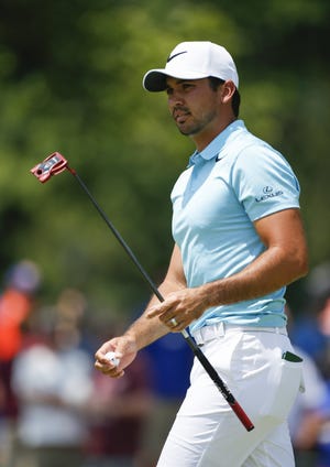 Jason Day walks off the ninth green during the final round of the Memorial Tournament. [Joshua A. Bickel/Dispatch]