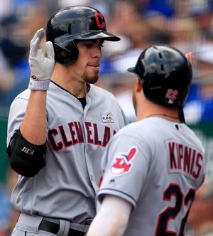 Cleveland Indians' Bradley Zimmer, left, is congratulated by teammate Jason Kipnis (22) following his two-run home run off Kansas City Royals starting pitcher Jason Hammel during the second inning of a baseball game at Kauffman Stadium in Kansas City, Mo., Saturday, June 3, 2017. (AP Photo/Orlin Wagner)
