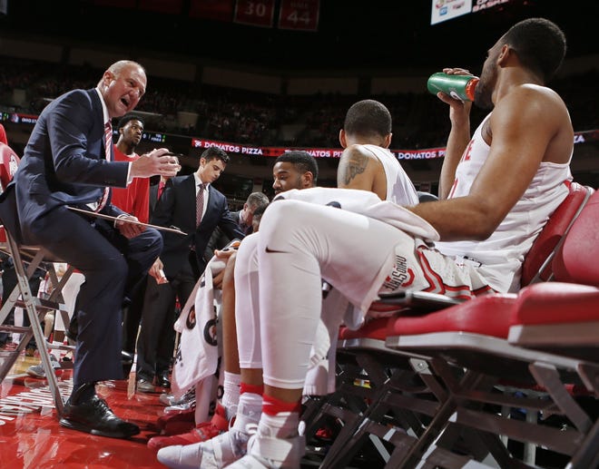 OSU coach Thad Matta used a chair during games and practices to help with his back problems. [Eric Albrecht/Dispatch]