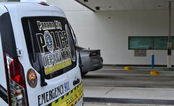 Crime Scene units on scene at Innovations Federal Credit Union on Monday in Panama City. [ERYN DION/THE NEWS HERALD]