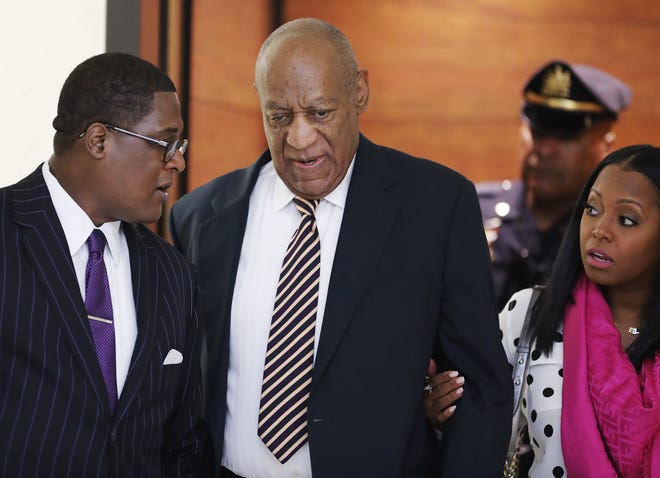 Bill Cosby arrives for his sexual assault trial with Keshia Knight Pulliam, right, at the Montgomery County Courthouse in Norristown, Pennsylvania on Monday. [David Maialetti/The Philadelphia Inquirer via AP, Pool]