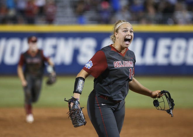 Oklahoma pitcher Paige Lowary shouts after striking out Florida's Kayli Kvistad to end the game in the 17th inning of the first game of the NCAA Women's College World Series. [Sue Ogrocki/The Associated Press]