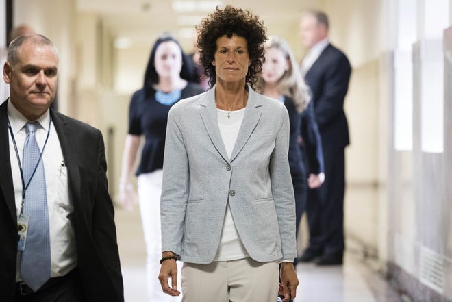 Andrea Constand walks to the courtroom during Bill Cosby's sexual assault trial at the Montgomery County Courthouse in Norristown, Pa., Tuesday, June 6, 2017. Cosby is accused of drugging and sexually assaulting Constand at his home outside Philadelphia in 2004. THE ASSOCIATED PRESS