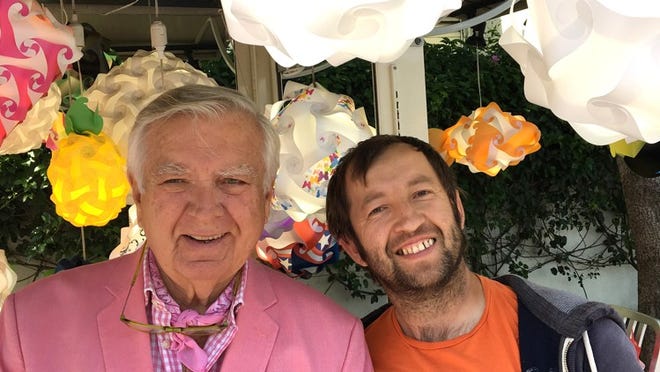 On a recent trip to the farmers’ market in West Hollywood, Calif., Carleton Varney, left, met Frank Iskhakov, a vendor who sells whimsical, ready-to-assemble lamps through his company, CreativeLamps.com. Photo courtesy Dorothy Draper & Co.