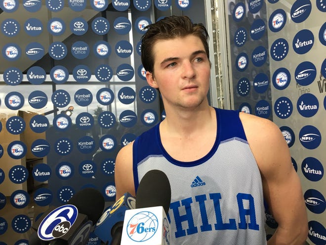 Medford's Steve Vasturia, a former Notre Dame and St. Joseph's Prep standout, listens to a question Wednesday after working out for the Sixers.