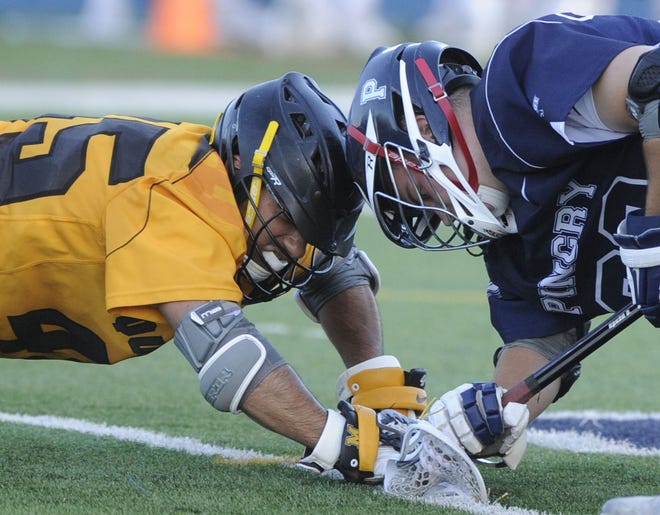 Moorestown's Frankie Labetti and Pingry's Cameron Wright battle for the faceoff in the Tournament of Champions semifinal game at Kean University on Wednesday, June 7, 2017.