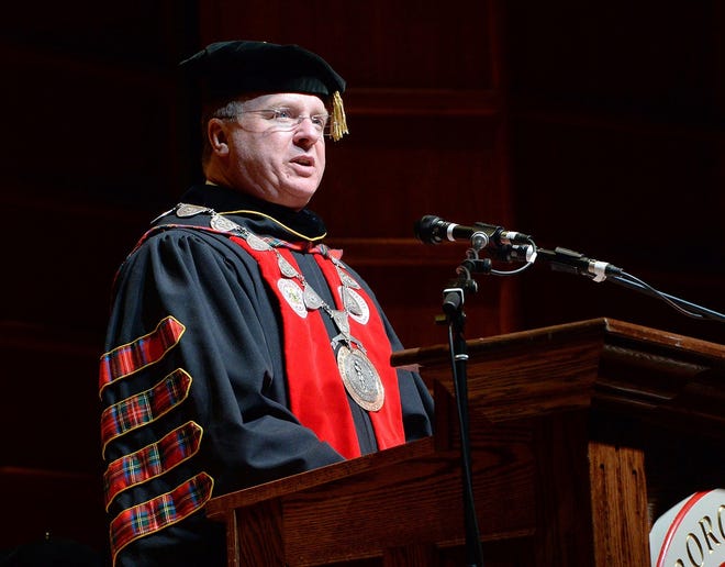 H. Fred Walker was installed as the 18th President of Edinboro University in the Cole Auditorium in Edinboro on March 23. [GREG WOHLFORD/ERIE TIMES-NEWS]