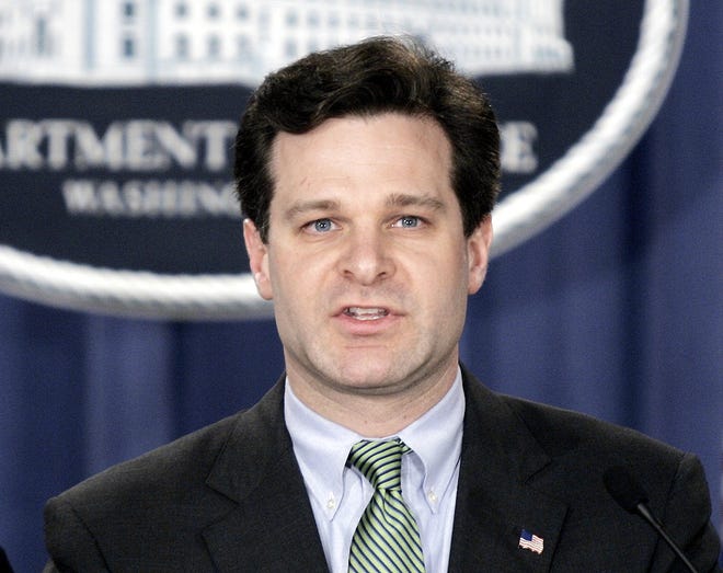 In this Jan. 12, 2005 file photo, Assistant Attorney General Christopher Wray speaks at a press conference at the Justice Department in Washington. President Donald Trump has picked Wray to be the next FBI director. Trump said on Twitter Wednesday that he will be nominating Wray, calling him “a man of impeccable credentials.” [LAWRENCE JACKSON/ASSOCIATED PRESS]