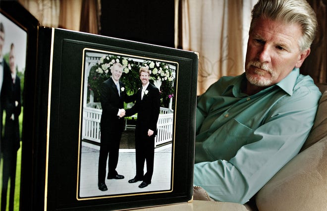 Leonard Spearing's son Leonard, pictured with him at a 2007 wedding, died of a heroin overdose at age 33, six days after he was released from a drug rehab in Philadelphia to what Spearing says was a recovery house in Bristol Township. The home's owner denied that it was a sober house. Photographed at Spearing's Horsham home Thursday, April 28, 2016.