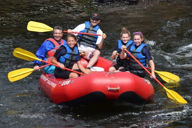 The group in this photo from the Whitewater Challengers website seems to be having an easier time of it than Julia and her friends did at the start of their adventure.