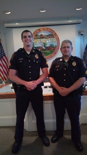 Rochester Police Officers Tom Powers, left, and Michael Miehle were sworn in as sergeants during Wednesday’s Rochester Police Commission meeting. [Photo/Courtesy]