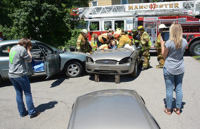 First responders from Manchester and Shortsville provided real-life assistance Wednesday to Red Jacket High School students taking part in a mock DWI demonstration. [Jack Haley/Messenger Post Media]