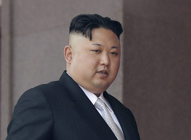 In this April 15, 2017, file photo, North Korean leader Kim Jong Un walks along his viewing balcony during a military parade in Pyongyang, North Korea to celebrate the 105th birth anniversary of Kim Il Sung, the country's late founder and grandfather of current ruler Kim Jong Un. South Korea's Joint Chiefs of Staff said in a statement that North Korea fired several projectiles off its east coast on Thursday, June 8, 2017. THE ASSOCIATED PRESS