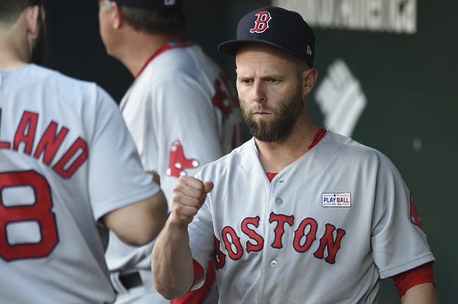 Boston's Dustin Pedroia fist pumps before the start of a game against the Baltimore Orioles on Saturday. After spending 10 days on the disabled list with a wrist injury, Pedroia will return to action today against the Detroit Tigers. [THE ASSOCIATED PRESS]