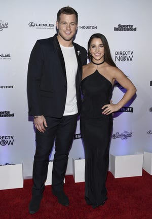 Colton Underwood, left, and Aly Raisman attend the Sports Illustrated Swimsuit 2017 launch event at Center415 on Thursday, Feb. 16, 2017, in New York. (Photo by Evan Agostini/Invision/AP)