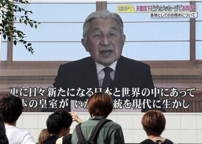 In this Aug. 8, 2016 file photo, a screen displays Japanese Emperor Akihito delivering a speech in Tokyo. Japan's parliament on Friday, June 9, 2017 passed a law allowing Emperor Akihito to become the first monarch to abdicate in 200 years. THE ASSOCIATED PRESS