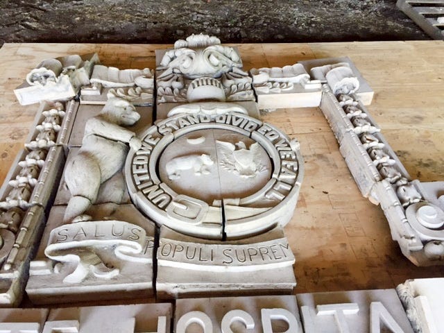 Three stone pieces of a bear on a Fulton State Hospital sculpture of the Missouri State Seal were missing, but have now been found by a Fulton parks worker. [Courtesy of Fulton Police Department]