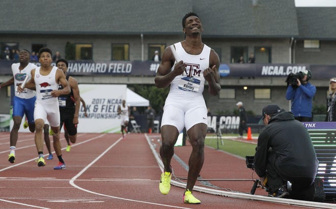 Texas A&M's Fred Kerley reacts after crossing the finish line victorious in the 4x400 relay but coming up short to the Florida Gators in the national championship team title race at the NCAA Track and Field Championship at Hayward Field in Eugene. (Andy Nelson/The Register-Guard)