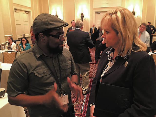 Gov. Mary Fallin talks to Oklahoma Press Association members following her speech and question-and-answer session Saturday. Chris Day/Examiner-Enterprise.