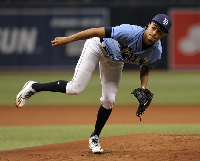 Tampa Bay Rays starter Chris Archer pitches against the Oakland Athletics during the first inning Sunday in St. Petersburg. [THE ASSOCIATED PRESS / STEVE NESIUS]