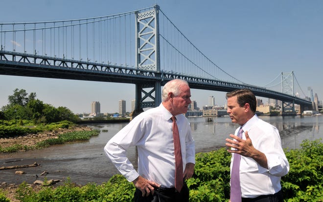 U.S. Reps. Patrick Meehan (left), a Republican from Pennsylvania, and Donald Norcross, D-1st of Camden, talk at Cooper Poynt Waterfront Park in Camden on Monday, June 12, 2017. The congressmen held a news conference on the shore of the Delaware River to discuss the importance of regional sharing of Prescription Drug Monitoring Program information with the goal of preventing opioid abuse.