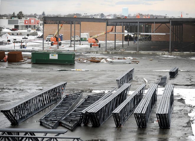 Steel trusses are ready for use in the future Market Basket building at the South Coast Marketplace site.