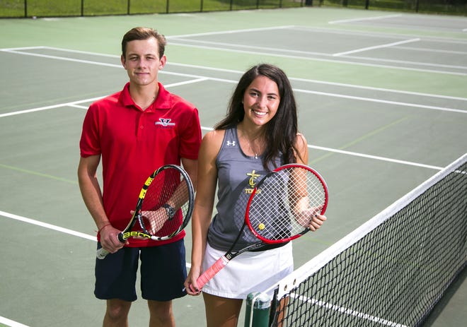 Sara Sutton from Trinity Catholic and Ian Barckhausen from Vanguard are the Star-Banner tennis players of the year. They are shown at the Tuscawilla tennis courts on Saturday. [Alan Youngblood/Staff photographer]