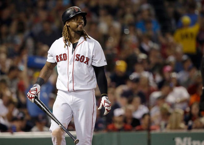 Boston Red Sox's Hanley Ramirez walks toward the dugout after striking out in the fifth inning of the team's baseball game against the Detroit Tigers, Sunday, June 11, 2017, in Boston.