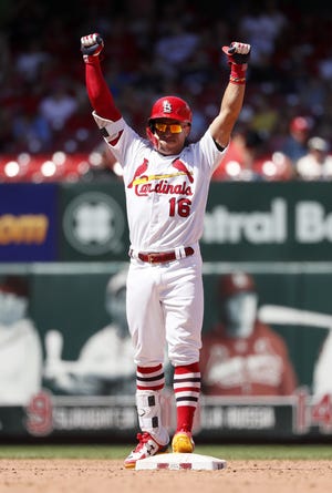 St. Louis Cardinals' Kolten Wong celebrates after hitting an RBI double during the sixth inning in the first game of a doubleheader against the Milwaukee Brewers Tuesday in St. Louis. [Jeff Roberson/The Associated Press]