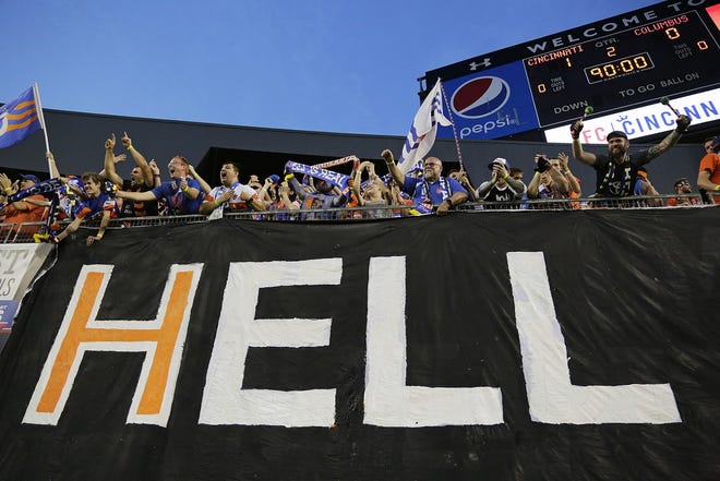 FC Cincinnati supporters embraced the "Hell is Real" mantra that Crew SC supporter Tony Galiffo coined for the match between the Ohio teams. [Adam Cairns/Dispatch]