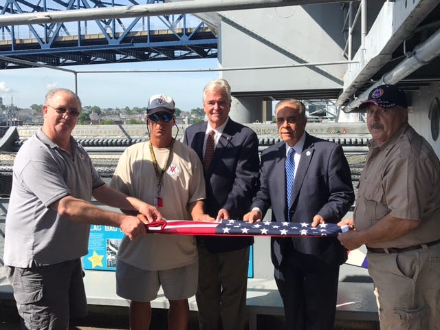 Wedneswday morning aboard USS Massachusetts Veterans Doc Ramsay, Michael L'archevesque, Victor Farias, raised 100 American Flags on Flag Day and folded them with John McDonagh, Director of Battleship Cove.
Enjoy Flag Day in Fall River.