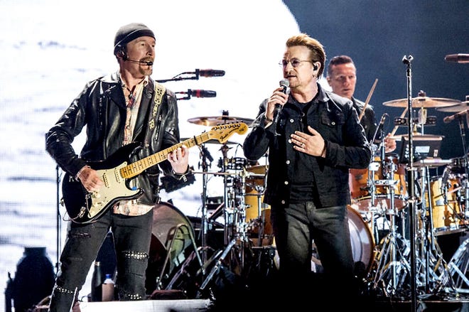 The Edge and Bono of U2 perform at the Bonnaroo Music and Arts Festival in Manchester, Tennessee, last Friday. The band will be performing "The Joshua Tree" in its entirety on Sunday at Lincoln Financial Field.