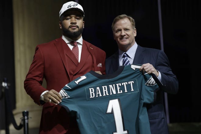 (File) Eagles first-round draft pick Derek Barnett gets high marks in this midterm report.