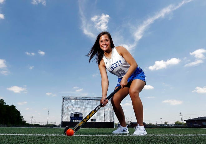 Scholar athlete Claire Buckey posing at her school, Olentangy Liberty. (Fred Squillante/Dispatch]