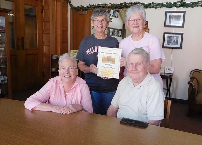 From left are, seated, Melinda Marley and Jim Garnsey, of the Ilion Free Library Foundation, and, standing, Jean Maneen and Fran Retzloff. Retzloff and Maneen, the 2016-17 winners of the Yellowstone House raffle to benefit the Ilion Free Library Foundation, will share pictures and stories about their Montana vacation at 6:30 p.m. on Tuesday, June 20, at the Ilion Free Public Library. [DONNA THOMPSON/TIMES TELEGRAM]