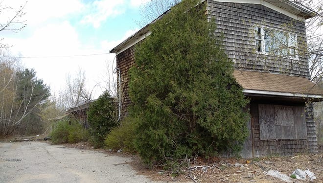 Somersworth has issued an RFP for the clean up at the former Breton's Cleaners site at 1 Winter St. [Judi Currie/Fosters.com]