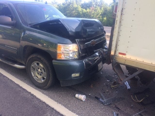 This Chevrolet pickup truck struck another vehicle from behind at a red light on Route 11 in Rochester Thursday morning. [Photo courtesy of Rochester Police]