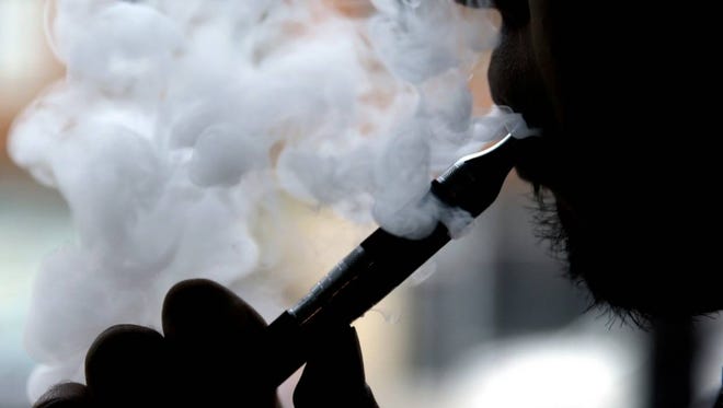A large government survey released Thursday, June 15, 2017, suggests the number of U.S. high school and middle school students using electronic cigarettes fell to 2.2 million last year, from 3 million the year before. (AP Photo/Nam Y. Huh, File)