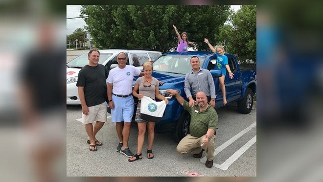 Friends of Palm Beach founder Diane Buhler leased a truck from Earl Stewart Toyota after the town could no longer help with trash pickups from private beach cleanups. Photo provided by Diane Buhler.