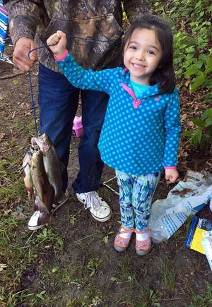 Four-year-old Julia Chandavong proved that even the youngest anglers can catch lots of fish at last year's Newmarket Fishing Derby. This year's derby will be held June 17. [Courtesy photo/Karen Schoppmeyer]