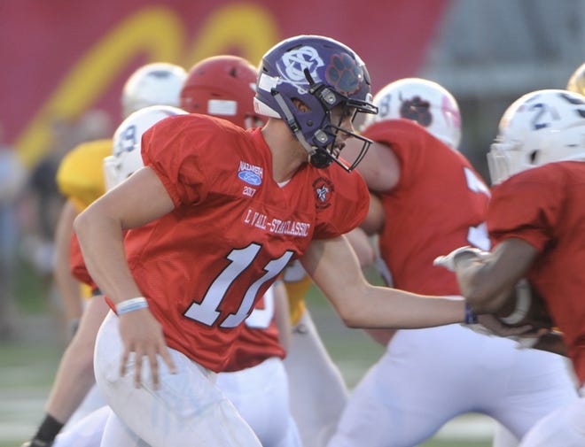 East Stroudsburg South's Jake Cirillo hands off the ball during a drive for the Red Team in the McDonald's All-Star game in Nazareth on Thursday night. Cirillo will attend East Stroudsburg University in the fall. [Keith R. Stevenson/Pocono Record]