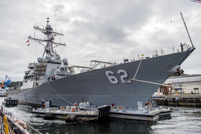 (File) In this image provided by the U.S. Navy, the Arleigh Burke-class guided-missile destroyer USS Fitzgerald (DDG 62) pulls into Dry Dock 5 in Yokosuka, Japan on June 15, 2016. The U.S. military says the Navy destroyer collided with a merchant ship off the coast of Japan and says there have been injuries. In a brief written statement, U.S. Pacific Fleet in Hawaii said the Navy has requested assistance from the Japanese Coast Guard. It said June 16. that the USS Fitzgerald collided with a merchant ship 56 nautical miles southwest of Yokosuka.