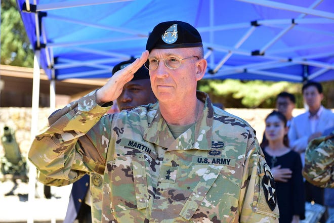 Maj. Gen. Ted Martin, 2nd Infantry Division/ROK-U.S. Combined Division commander, salutes during the 2ID/RUCD Memorial Day ceremony at Camp Red Cloud, Korea on May 25. (2nd Infantry Division/ROK-U.S. Combined Division)